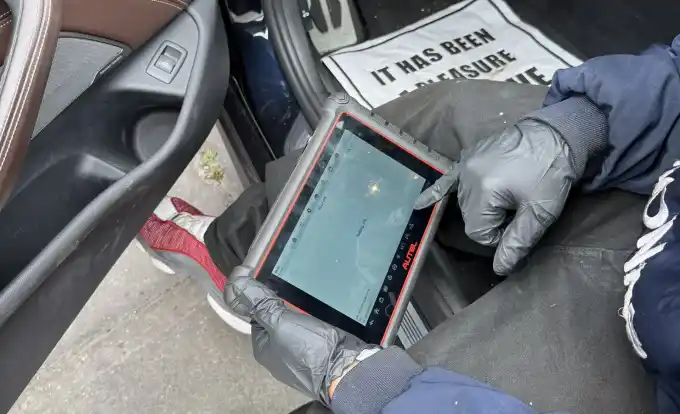 Autel scanner showing live data graph from a BMW M550i (G30 N63 V8) during diagnostic at Beacon Auto Care San Mateo