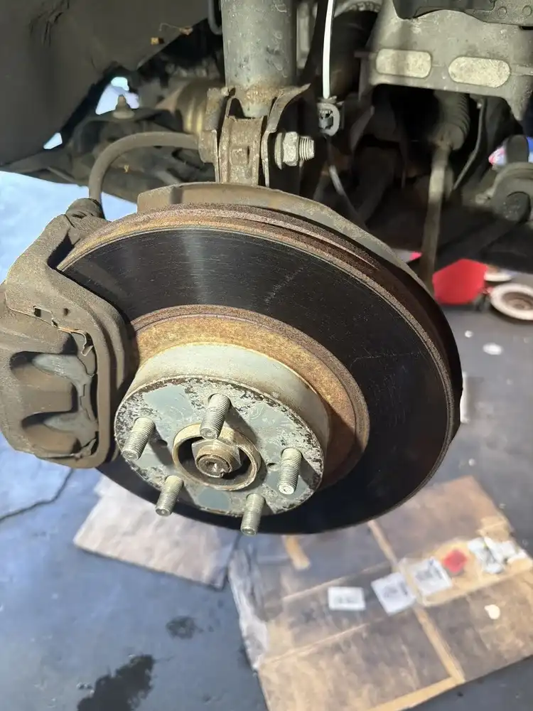 Brake pad friction material gone — grinding diagnosis at Beacon Auto Care San Mateo