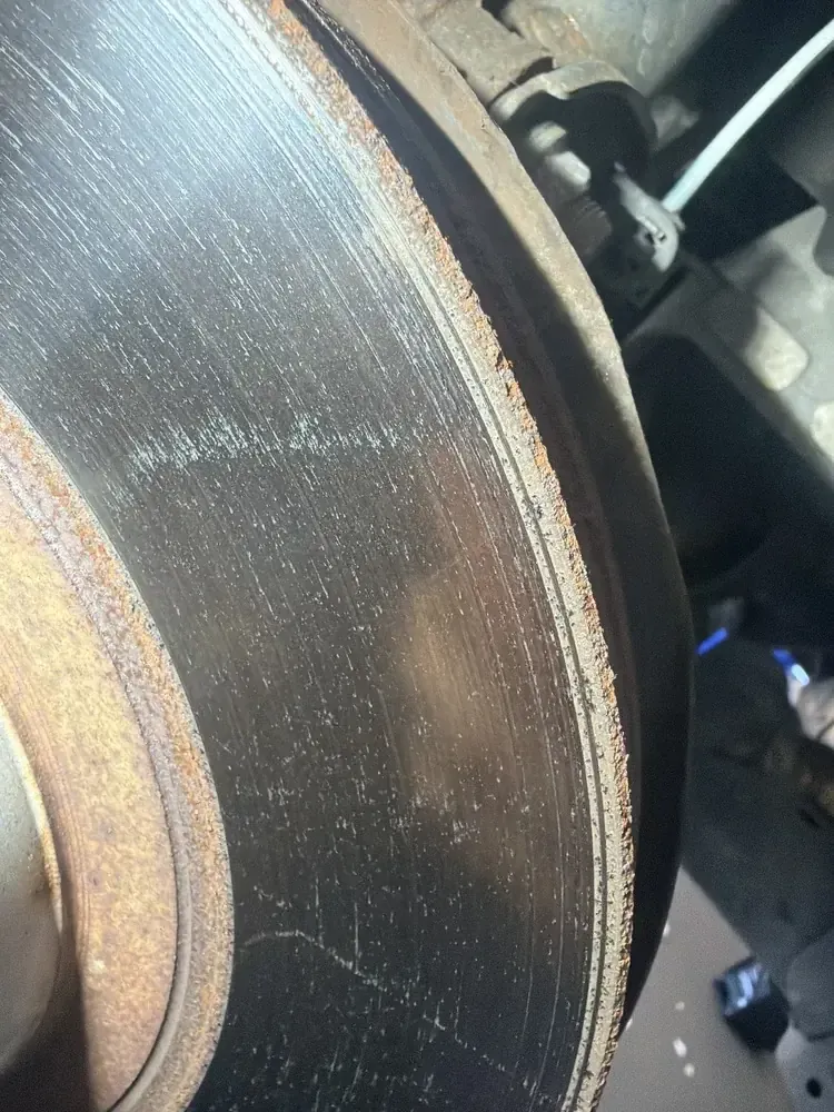 Brake rotor with visible grooves out of spec