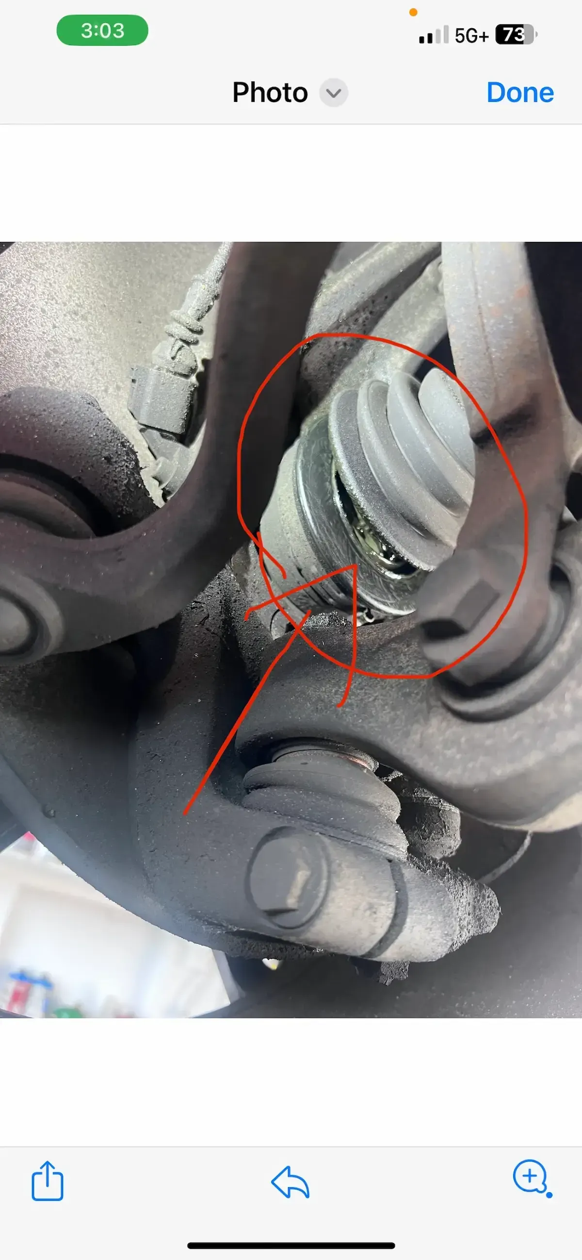 Sample DVI report on phone showing CV axle inspection photos at Beacon Auto Care San Mateo