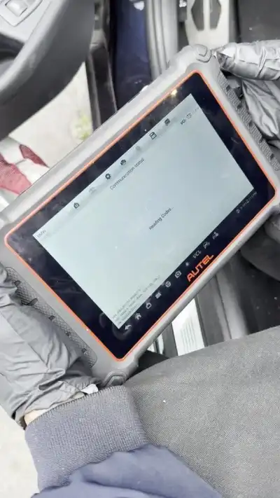 Autel professional scan tool displaying fault codes read from a BMW — shop clip thumbnail